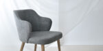 dining chair in grey upholstery and oak