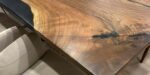 dining table with walnut and black epoxy