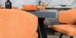 dining set black oak table and orange chairs