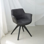 dining chair in grey upholstery and black legs